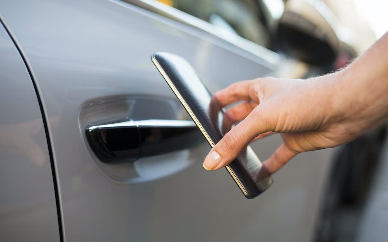 Is data security keeping up with connected cars? - opening a car door with a mobile phone