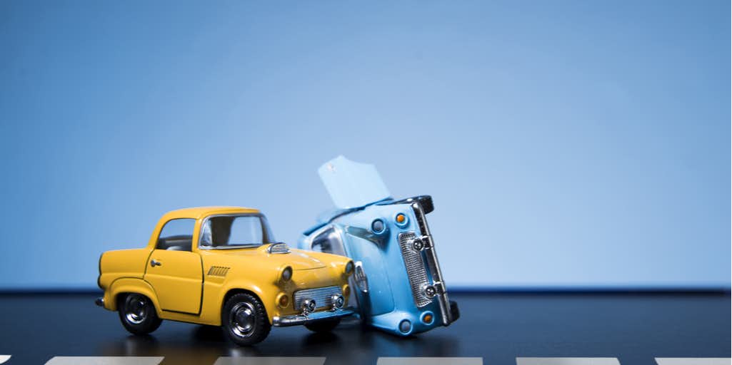 Two toy cars involved in a car accident