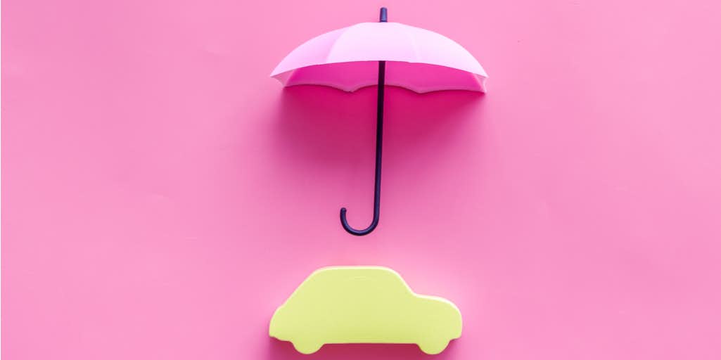 Car underneath an umbrella