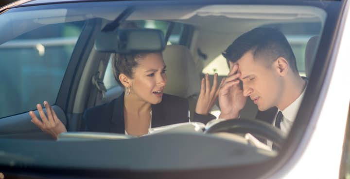 Couple having argument in car