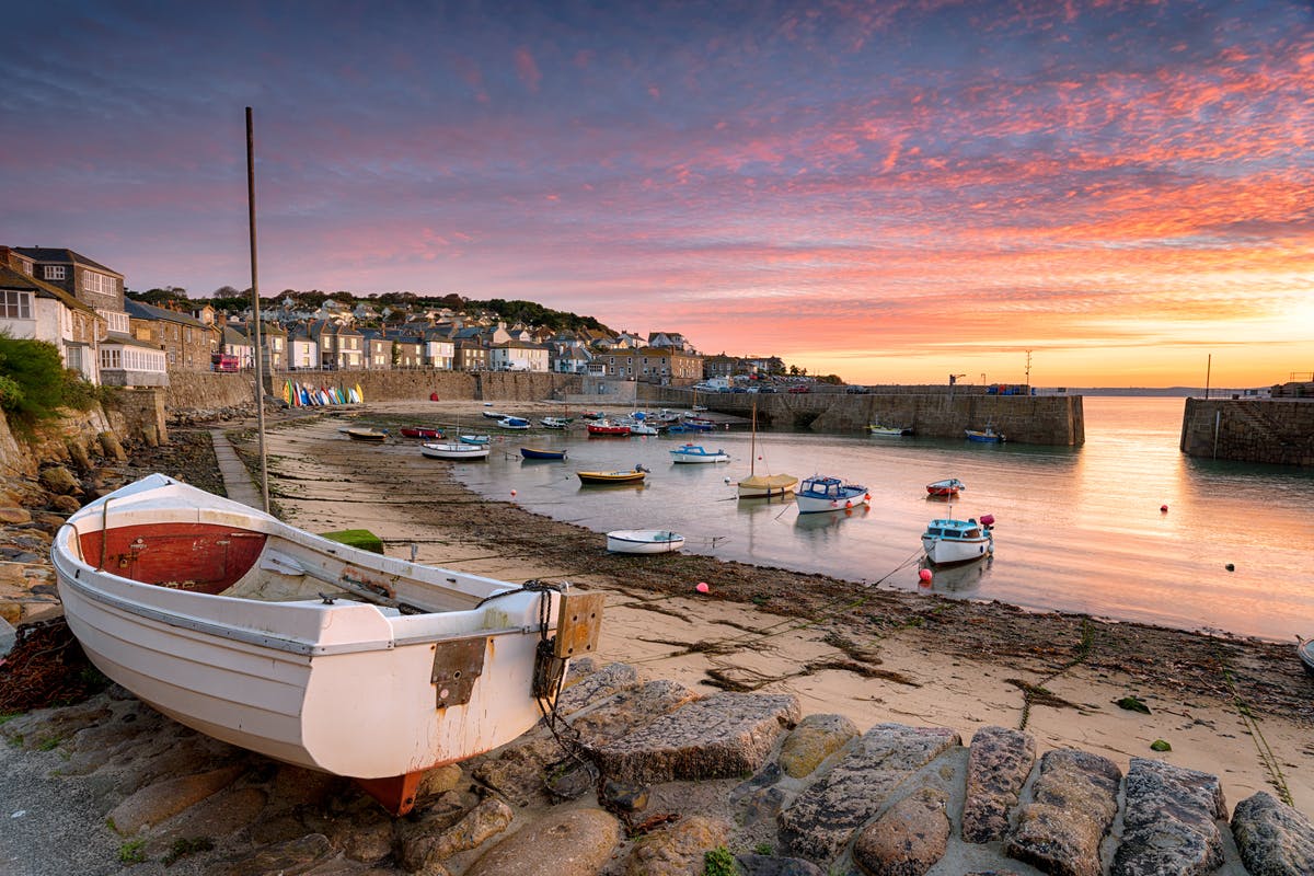 The picturesque harbour in Mousehole, an old fishing village in Cornwall 
