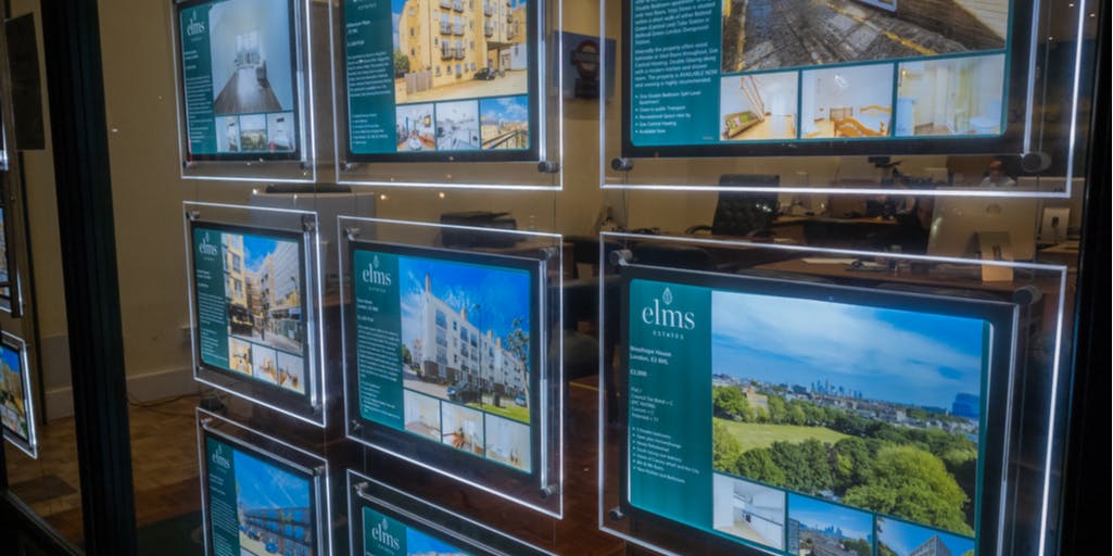 A wall of property listings