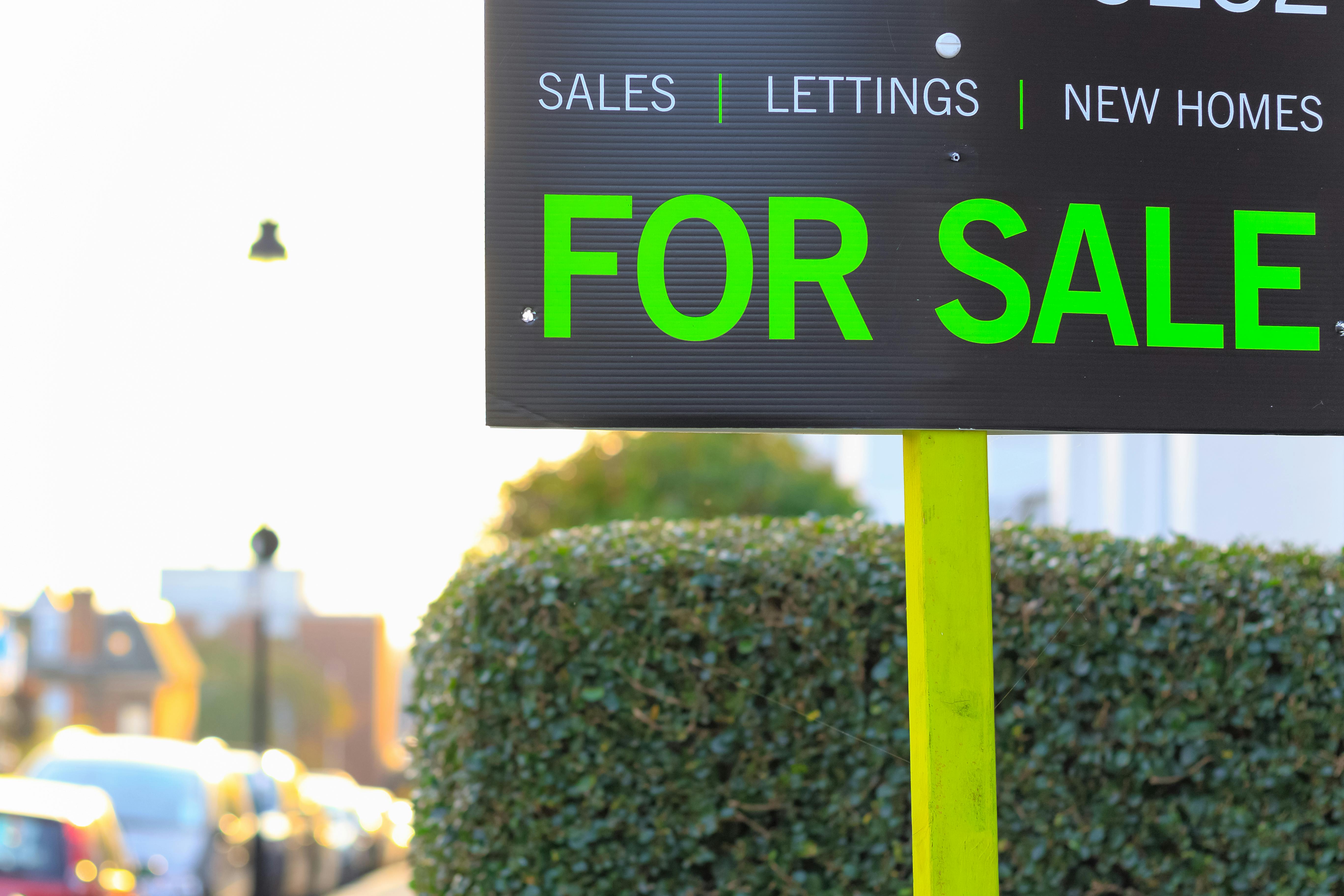 House prices for sale sign estate agent